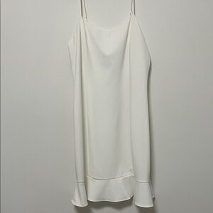 Stylish White Slip Dress with Ruffle Hem